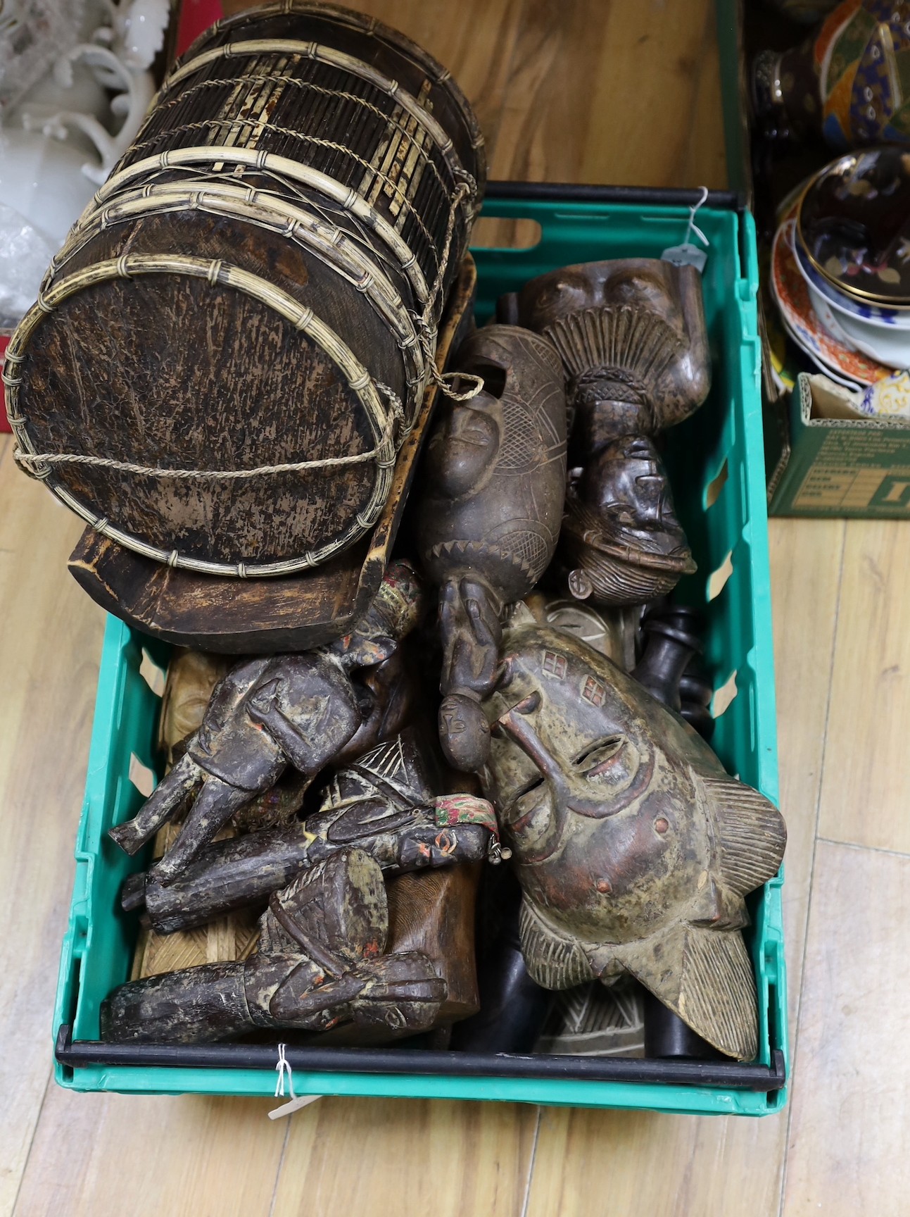 A group of African / Indian wood carvings, masks, etc.